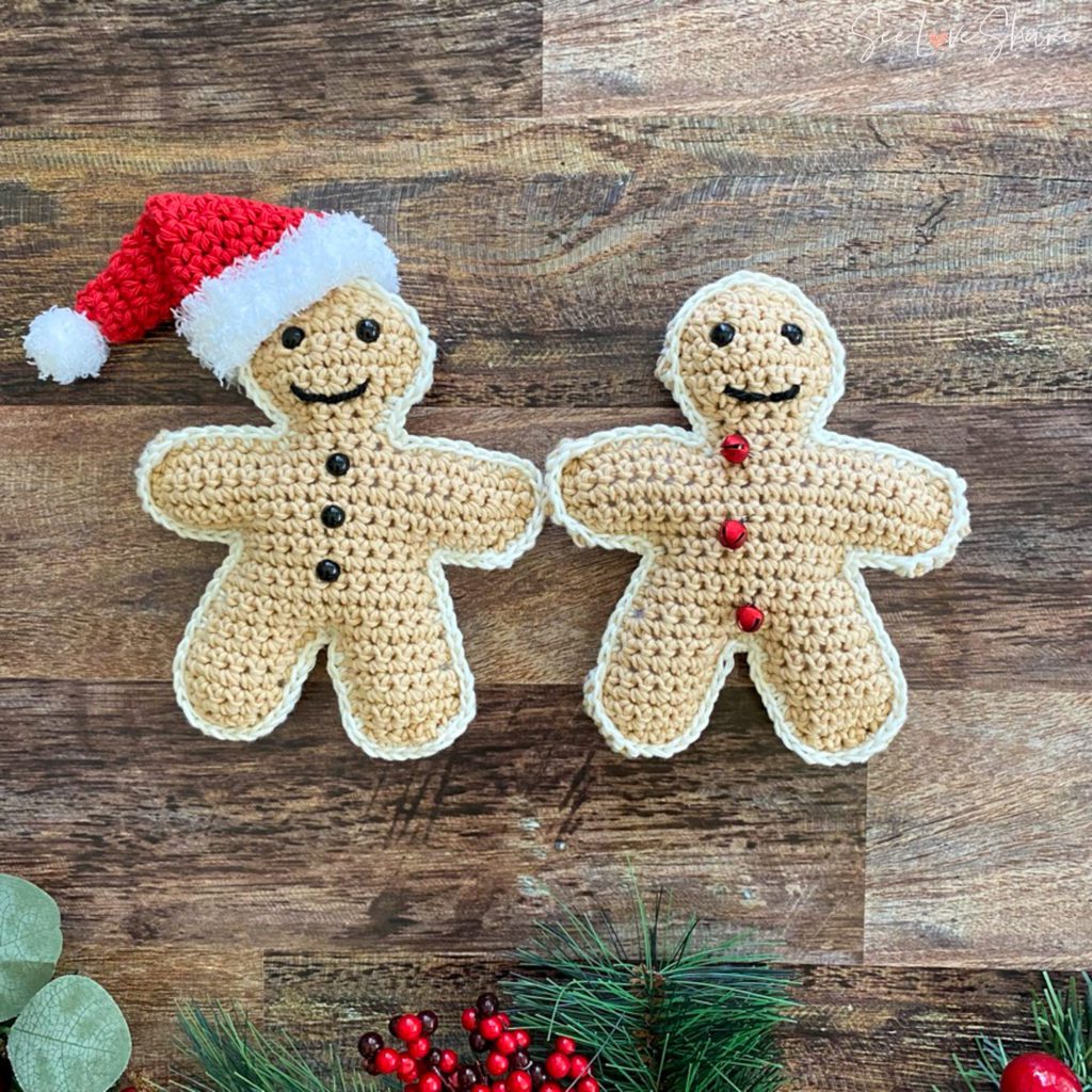 finished crochet gingerbread man pattern stuffies displayed for Christmas