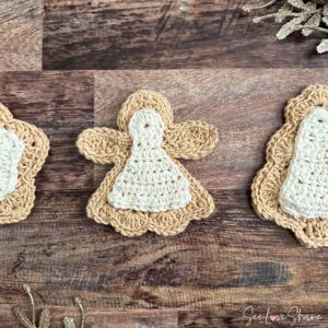 Crochet angel sugar cookie ornament with frosted wings