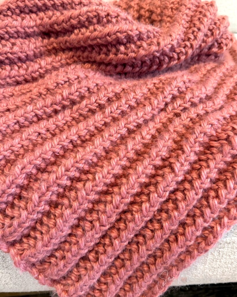 mistake rib knit throw in Lion Brand Re-Spun Desert Sand colorway