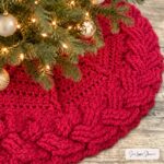 Crochet cable braid tree skirt in cranberry red